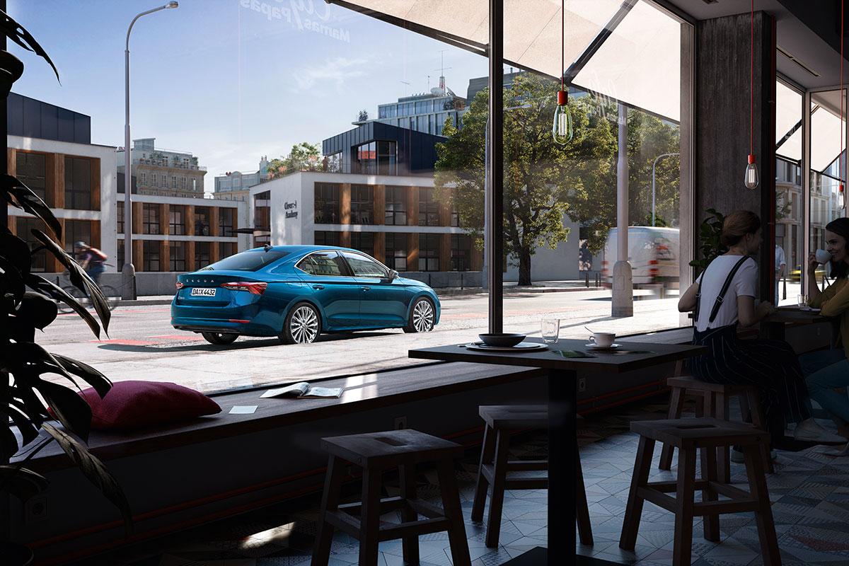 Ein über AutoCredit finanziertes Fahrzeug parkt vor einem Cafe